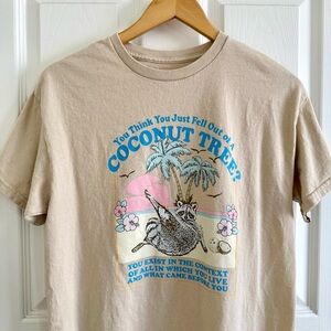 Quirky existential raccoon graphic tee